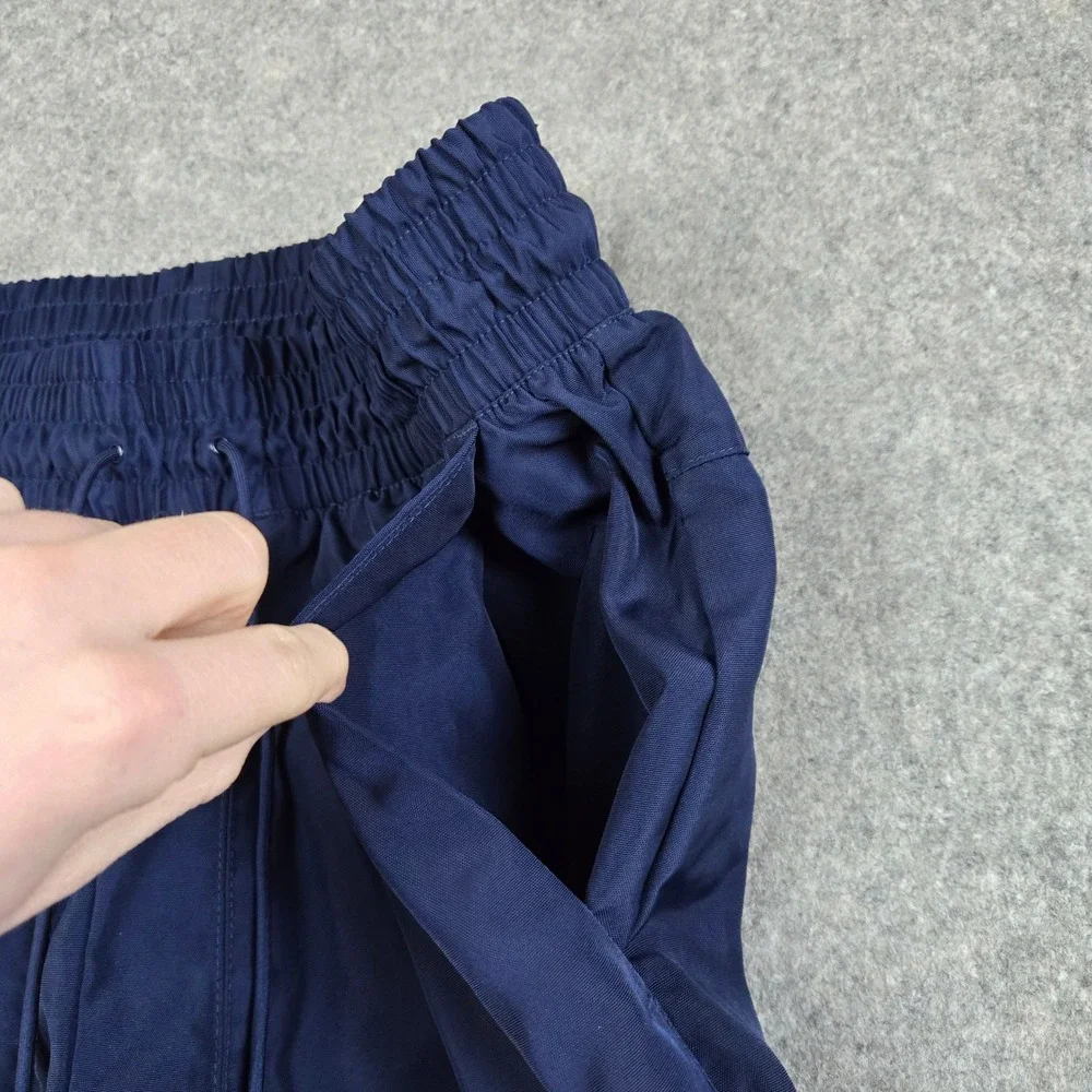 Nike‎ Track Pants Mens Medium Navy Blue Swoosh Logo Cuffed Joggers Sportswear
